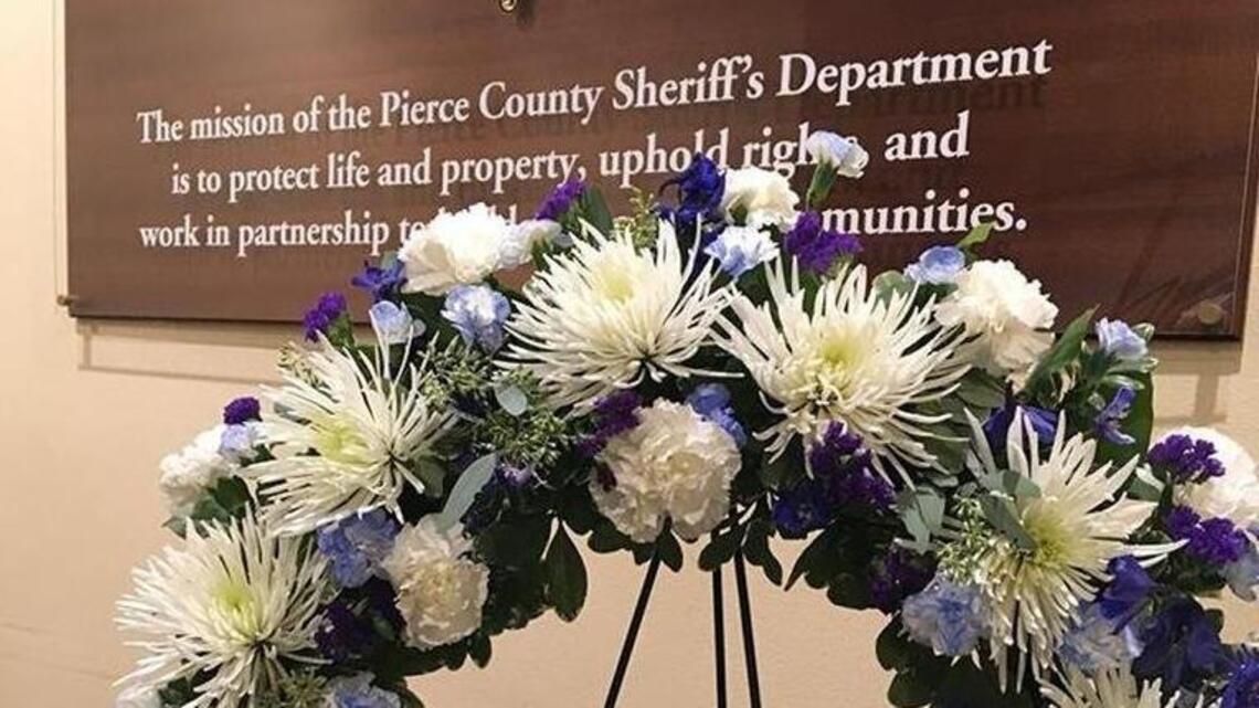 Evil Empire with a big heart. Yankees pay tribute to fallen Pierce County deputy