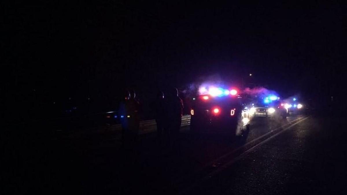 Puyallup police near where burglary suspect jumped in Puyallup River to evade capture.