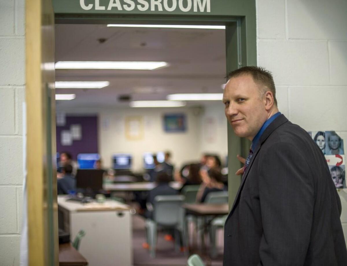 T.J. Bohl, the Pierce County Juvenile Court Administrator, stands outside a classroom in the detention facility within Remann Hall, February 11, 2016.