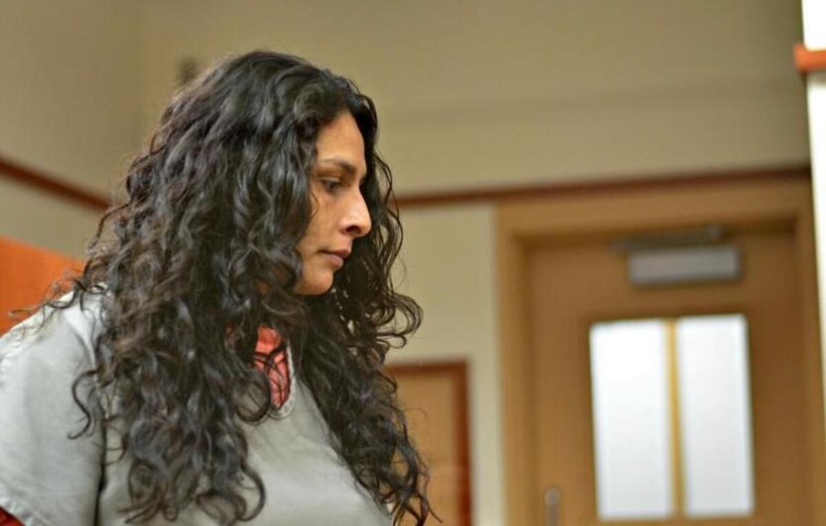 
Myra Aguilar enters Pierce County Superior Court on Monday to be arraigned on charges she absconded with her infant son to avoid turning the boy over to the state.
