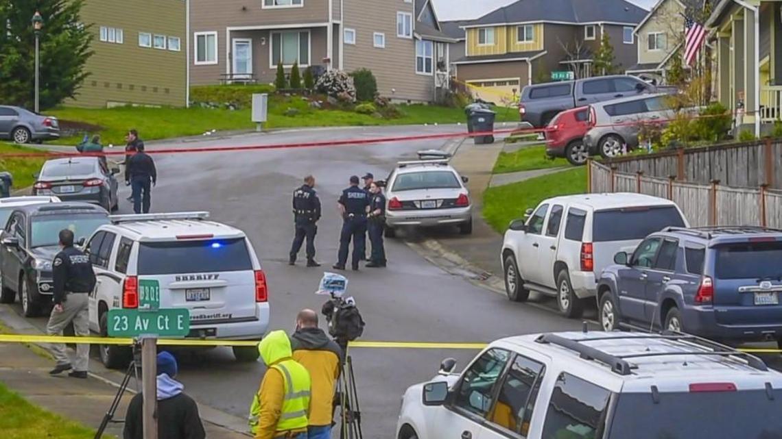 Sheriff’s deputies work the scene of carjacking and deputy-involved shooting Friday in Frederickson.