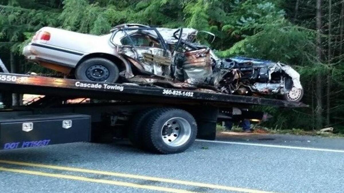 This 1990 Honda Accord crashed off state Route 410 early Sunday morning. One occupant died, and the other four people inside were seriously injured. The driver will face a count of vehicular homicide and three counts of vehicular assault for driving while intoxicated, according to the Washington State Patrol.