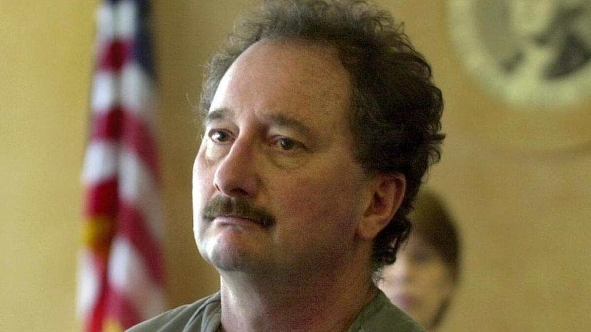 Lawrence Shandola turns to leave Pierce County Superior Court on Jan. 25, 2001, after being charged in the death of Tacoma businessman Robert Carl Henry.