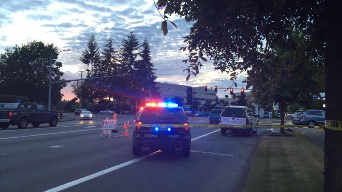 Police investigate the scene of a shooting Monday night near the intersection of Union Avenue and Plum Street.