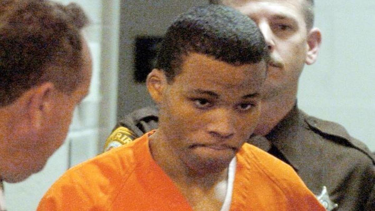 In a Tuesday, October 26, 2004 photo, convicted sniper Lee Boyd Malvo enters a courtroom in the Spotsylvania Circuit Court in Spotsylvania, Va. Malvo, convicted in the deadly sniper attacks that terrorized the Washington, D.C., area in 2002, says two others planned to participate in the attacks but backed out. The revelation comes in a prison interview for the Thursday premier of "Confessions of the DC Sniper with William Shatner: An Aftermath Special" on the A&E television network.