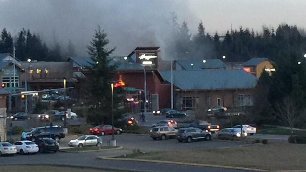 Fire broke out Thursday at a grocery store in the Lakeland Hills area of Auburn, forcing firefighters to evacuate the building.