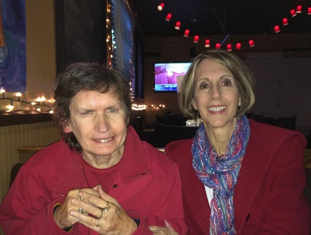 Maryann Stallone, left, and sister Cathy McIvor smile for a photo while out to eat in late 2016. Stallone is autistic and has the mental capacity of an 8-year-old. The women sued the state, alleging it failed to protect Stallone from being raped by a worker at the Department of Social and Health Services facility where she lives. Stallone’s family chose to publicize her name and photo.