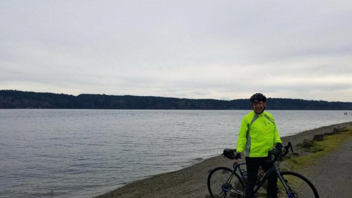 Doug Terrien, 59 and an avid cyclist, was left in a coma after being struck by a truck in a hit-and-run Tuesday evening in Puyallup, son Ryan Terrien said.