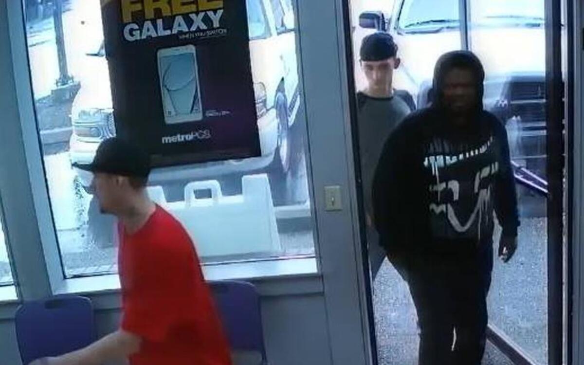 Three men walk into a cellphone store last month in Midland to steal smartphones, according to the Pierce County Sheriff’s Department. Deputies are seeking help from the community in identifying the men.