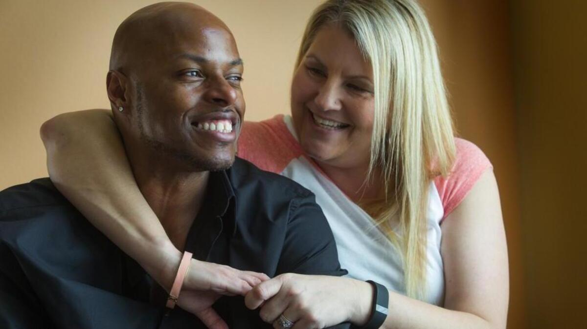 Barry Massey sits with his wife, Rhonda, after nearly three decades in prison. The youngest person in the U.S. sentenced to life without parole, Massey says, “I’m not him anymore.”