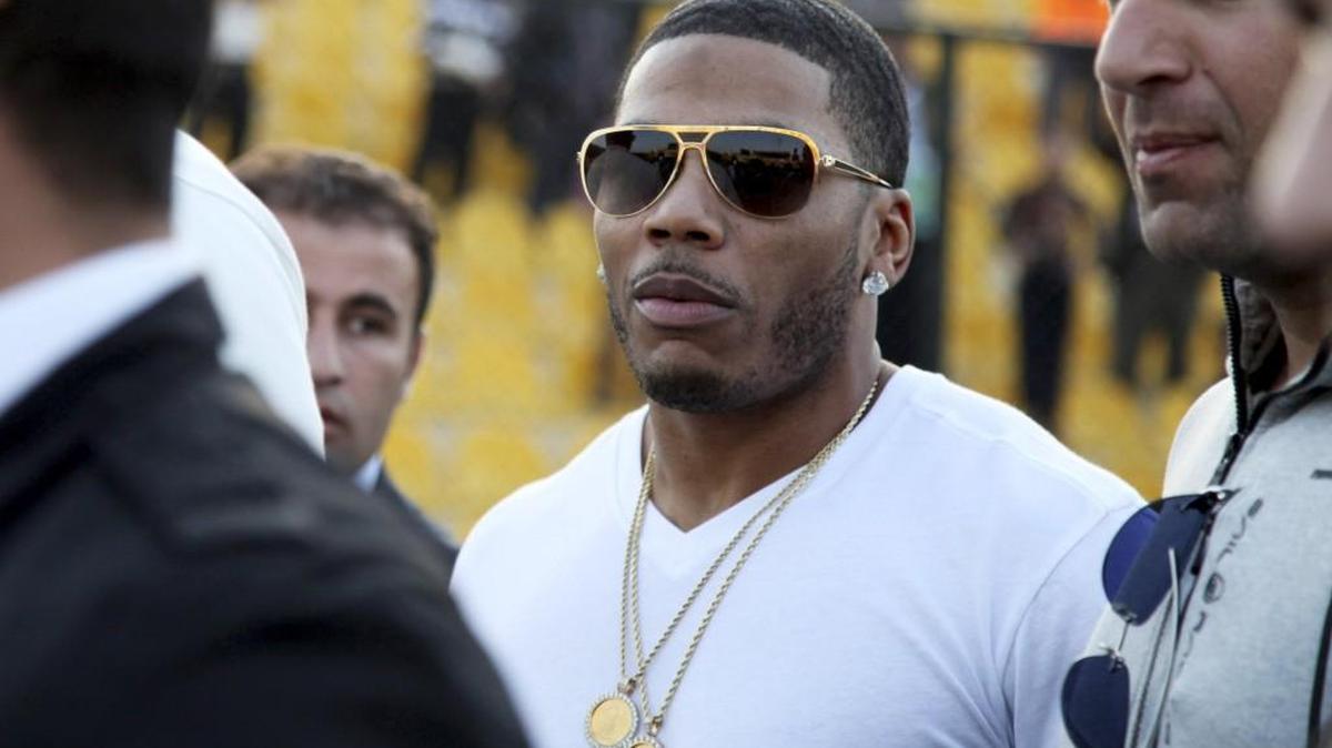 Nelly approaches the stage for a concert in Irbil, Iraq, in March 2015. He was arrested Saturday morning in Auburn on suspicion of rape.