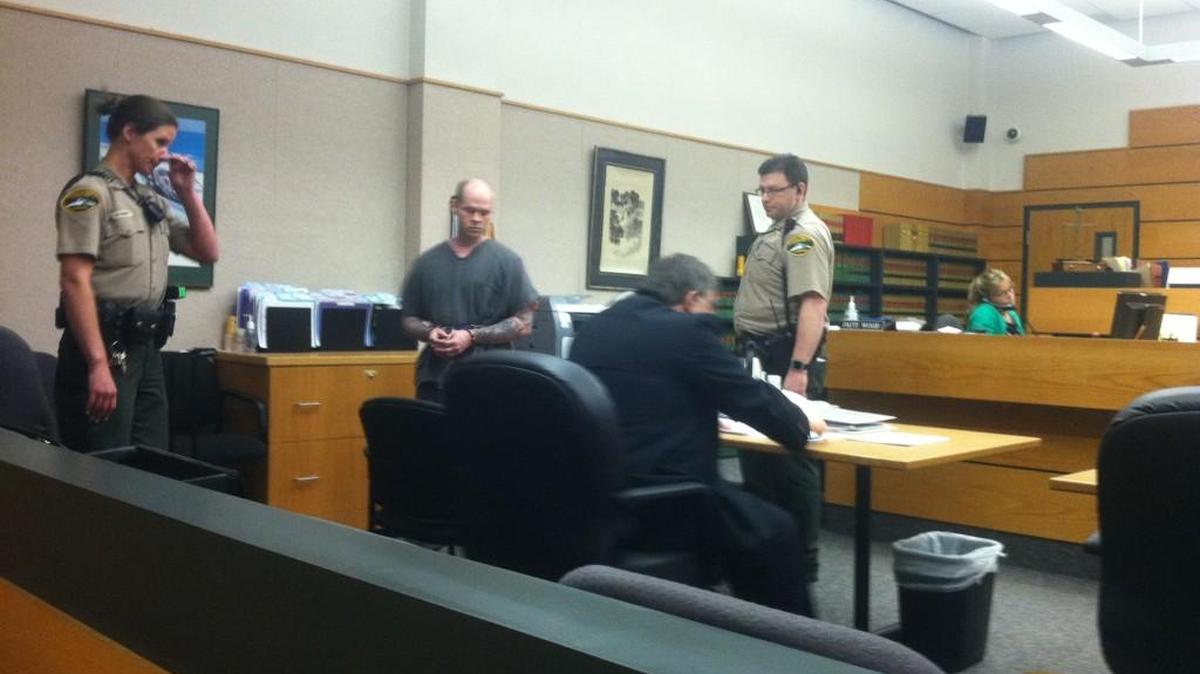Brandon Lee Farmer, second from left, takes a seat at his first-degree murder sentencing Thursday afternoon in Pierce County Superior Court in Tacoma.