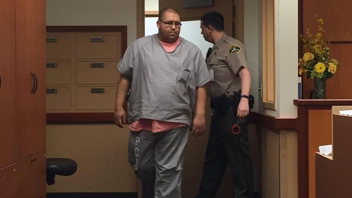 Adam Parks enters Pierce County Superior Court on Wednesday afternoon. He is charged with third-degree child rape.