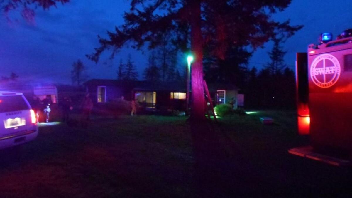 A 46-year-old man who twice eluded police searches, is in jail on gun, drug and stolen property charges after being captured by a Pierce County Sheriff’s Department SWAT team.