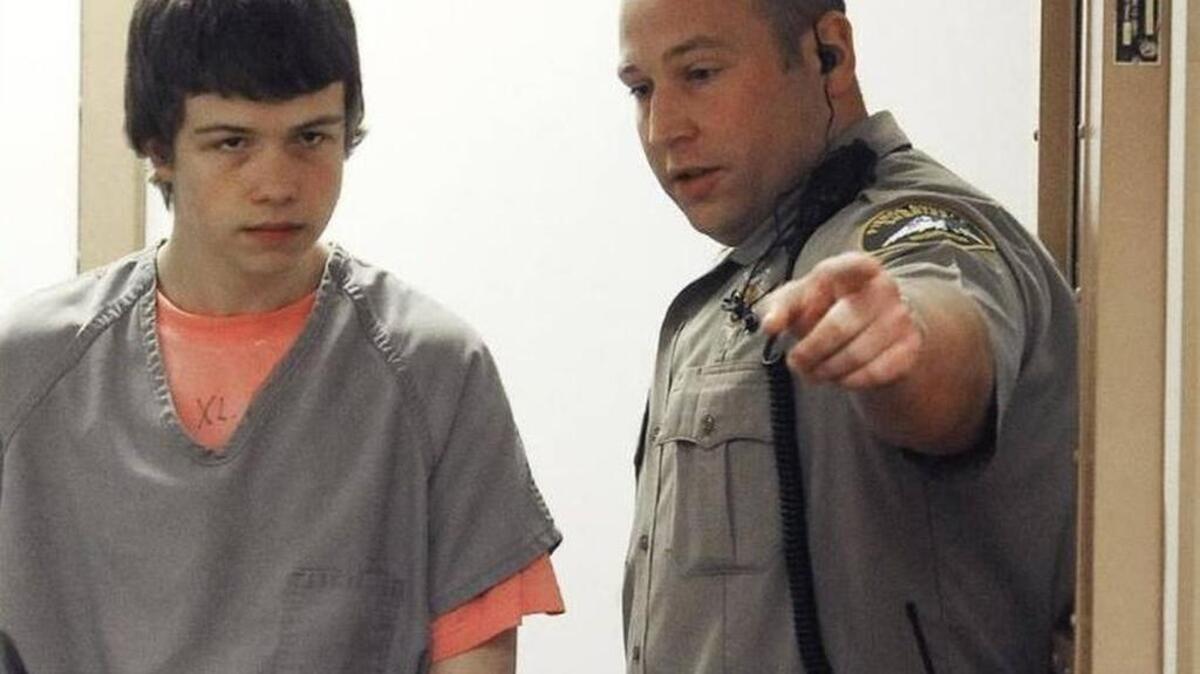 Rylan Salzman enters Pierce County Superior Court for his arraignment in June 2014. He pleaded guilty Monday to second-degree murder in the beating death of his father.