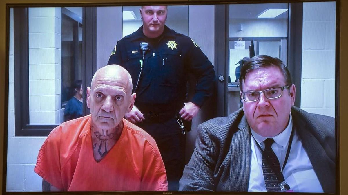 James E. Stidd (left) appears with assigned counsel defender John Hansen via video in Thurston County Superior Court in Olympia on June 10, 2016.