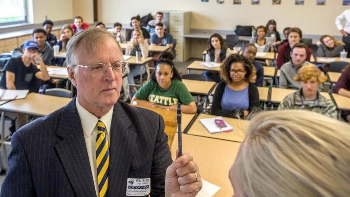 Pierce County Superior Court Judge Ron Culpepper pretends to be a traffic officer giving a sobriety test in front of students at Wilson High School last week. The visit was part of Law Week.