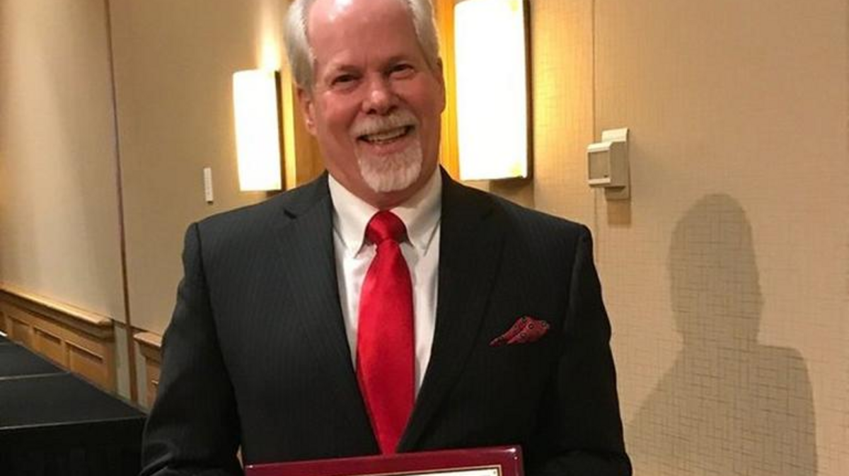 Frank Hewins, chief of Franklin Pierce Schools, accepts the Superintendent of the Year award in Bellevue earlier this month.