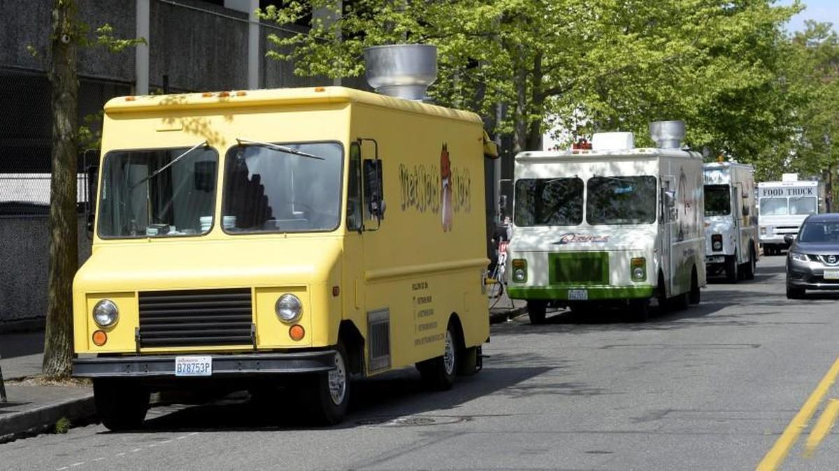 Food trucks line Market Street in Tacoma on May 1, 2015, during a food truck get-together.