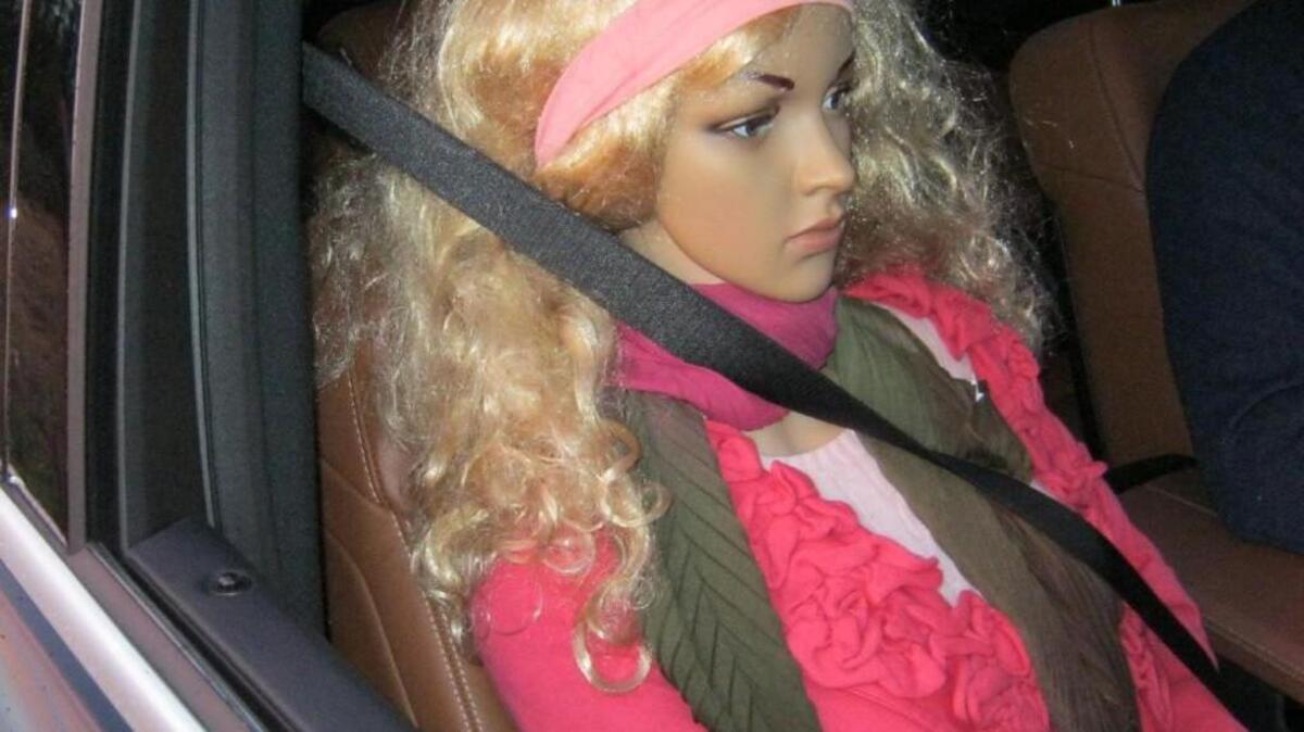Driver ticketed by Washington State Patrol for speeding in a high occupancy vehicle lane with a doll buckled in the passenger seat.
