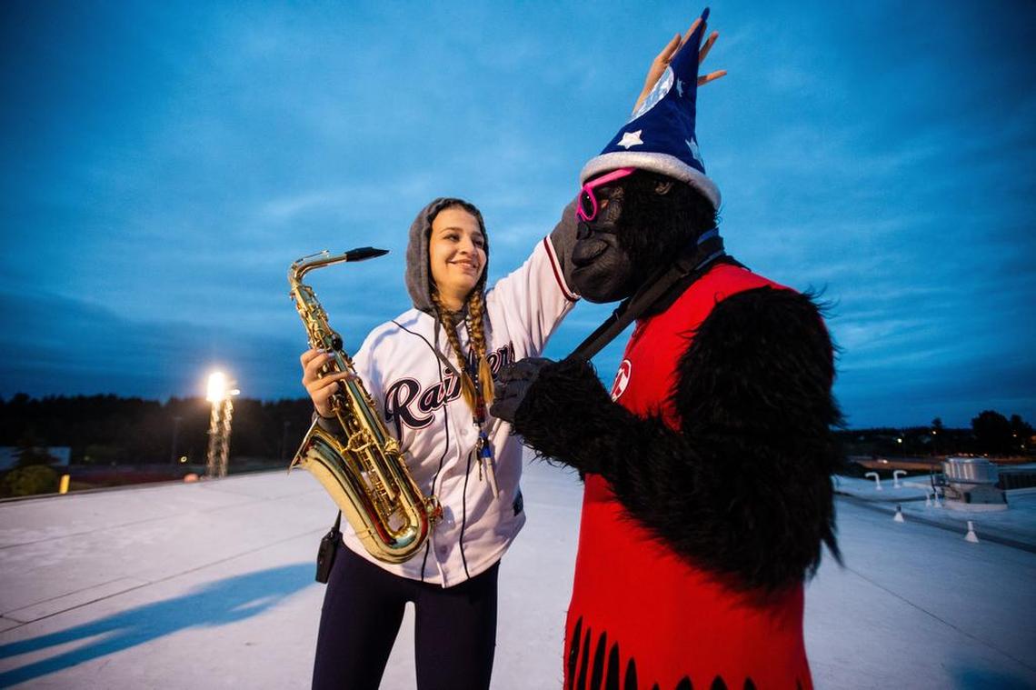 Hailey Heidrich helps prepare Epic Sax Gorilla during the Tacoma Rainiers’ game against the Las Vegas 51s at Cheney Stadium in Tacoma, Wash., on Thursday, June 28, 2018.