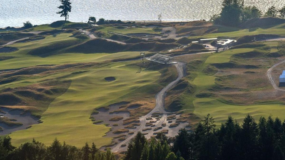 
The now legendary lone fir stands out amid the rolling landscape of the links style golf course at Chambers Bay. An 18-hole golf course and a large resort-hotel are no longer planned for Chambers Bay in University Place. Instead, Pierce County officials have asked the California developer behind the project for a smaller development.
