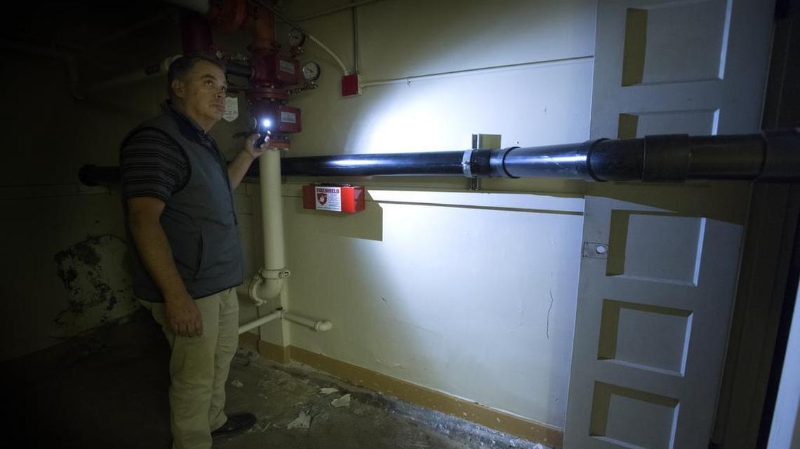 Franklin Pierce School District assistant director of operations Doug Vanderleest checks the sewage line that was put in to deal with blocked sewage at Collins Elementary School. Approval of a $157 million bond means the school district will replace five aging elementary schools, including Collins, and upgrade other facilities.