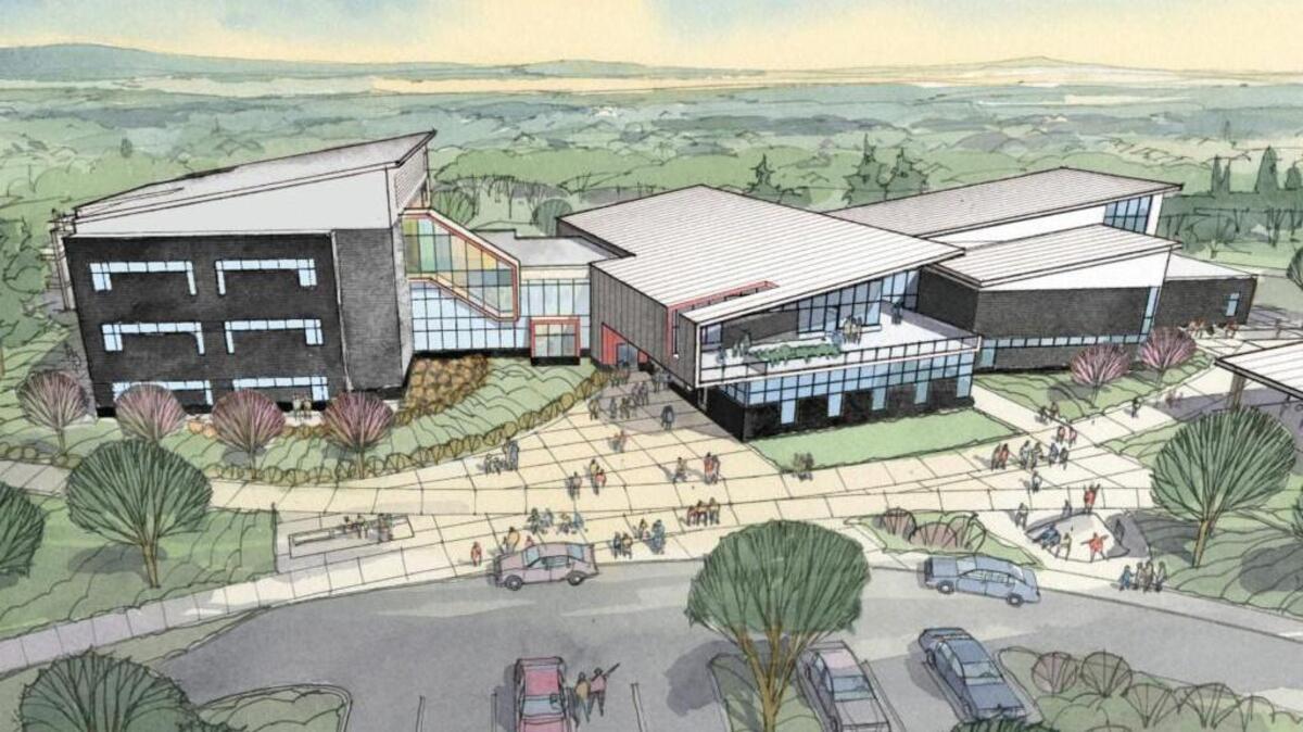 This 2014 rendering shows the proposed building for the new Wainwright Intermediate School in Fircrest, which will not open on time, according to Tacoma Public Schools.
