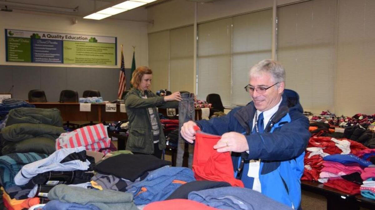Counselors selected clothing for students in need. An anonymous donor gave $30,000 worth of new items to Clover Park School District.
