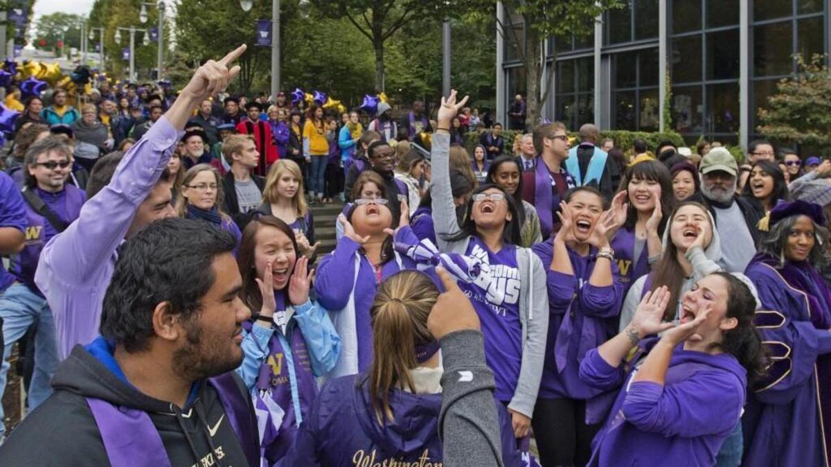 
Students cheer “Husky” at the beginning of the 2013 convocation at the of University of Washington Tacoma. This year’s Convocation, which is Friday, will welcome incoming students and their families to the UW Tacoma and Tacoma communities.
