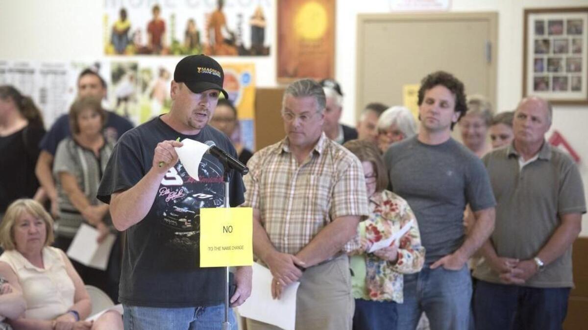 Phil Evans, a 1995 North Thurston High School graduate, speaks against the district name change during the North Thurston Public Schools board meeting's at Chinook Middle School in Lacey on Thursday, May 12, 2016.