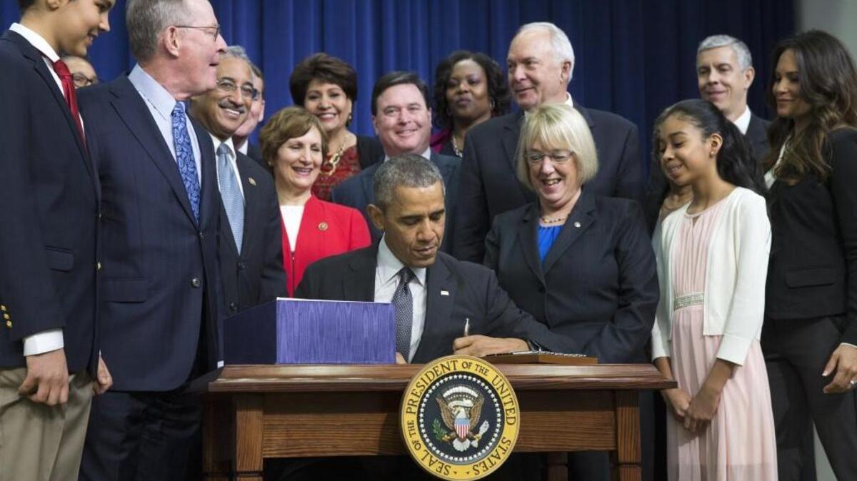 President Barack Obama signs the Every Student Succeeds Act on Dec. 10, 2015, in Washington. U.S. Sen. Patty Murray, D-Wash., is to the right of the president, and U.S. Sen. Lamar Alexander, R-Tenn., is second from left.