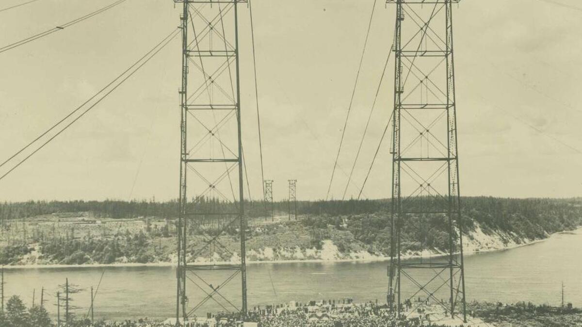 More than a decade before engineers began planning a bridge across the Tacoma Narrows, Tacoma was building the longest transmission line span in the world over the same channel. The Cushman Dam electrical project required spanning 1.3 miles between two sets of 300-foot-high towers in the city.