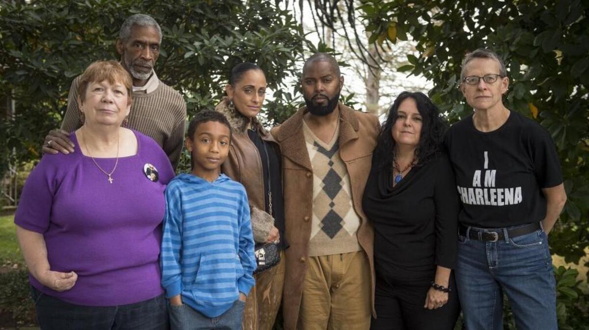 From left: Annalesa Thomas, Fredrick Thomas, Elijah Thomas, Athena Taylor, Andre Taylor, Nina Martinez, and Leslie Cushman are all involved with De-Escalate Washington, the campaign running the I-940 initiative. Photographed in Fife, Wash., on Saturday, Oct. 14, 2017.