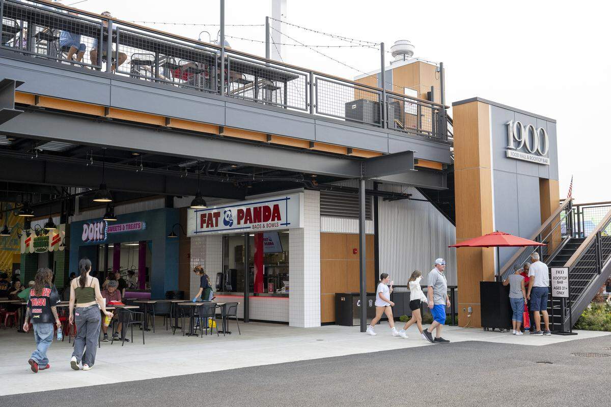 People move about the new 1900 Food Hall &amp; Rooftop Bar on Thursday, Sept. 4, 2025, at the Washington State Fair Event Center in Puyallup, Wash.