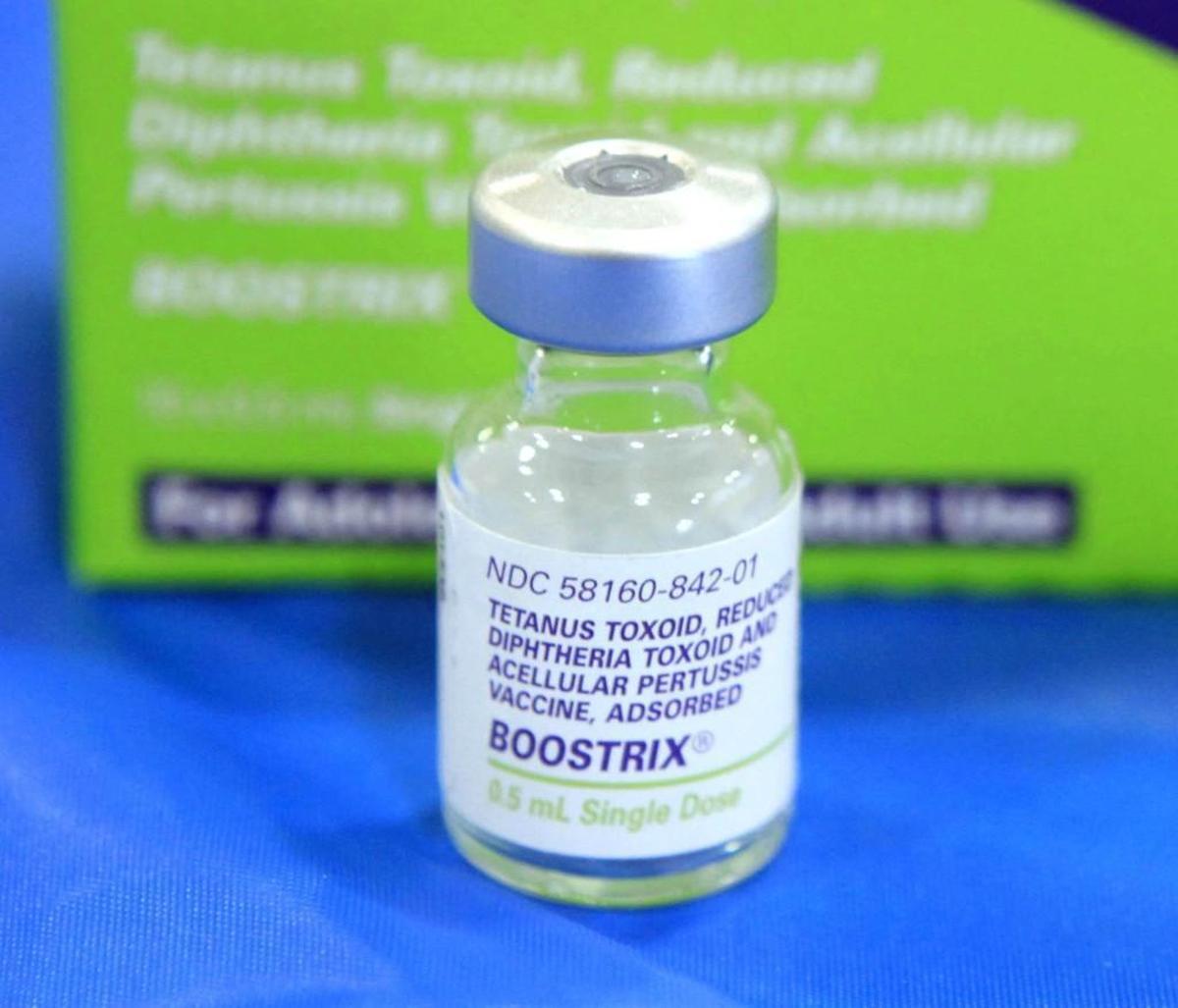 This file photo shows an empty bottle of Tetanus, Diphthera and Pertussis, (whooping cough) vaccine.