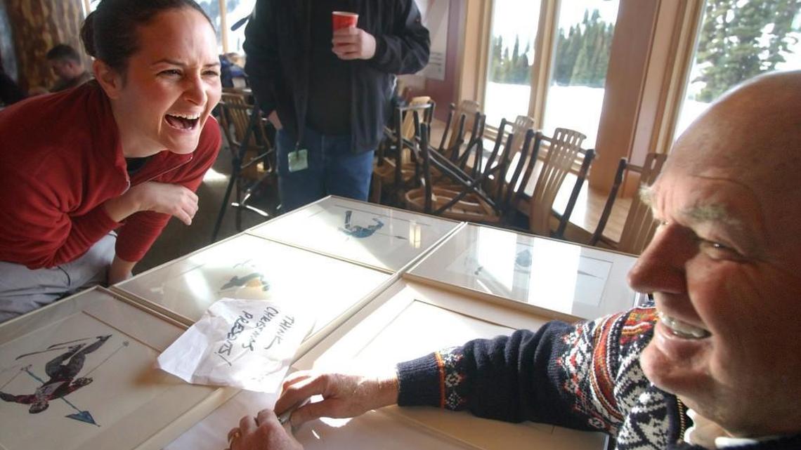 Warren Miller (right) was the feature speaker during ceremonies at the new $4.1 million Campbell Basin Lodge at Crystal Mountain in 2004.