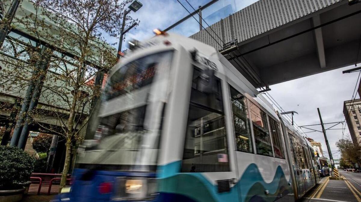 A Link light rail train leaving the Commerce Station. Downtown On the Go is organizing a celebration of local breweries and transit, called Link & Drink.