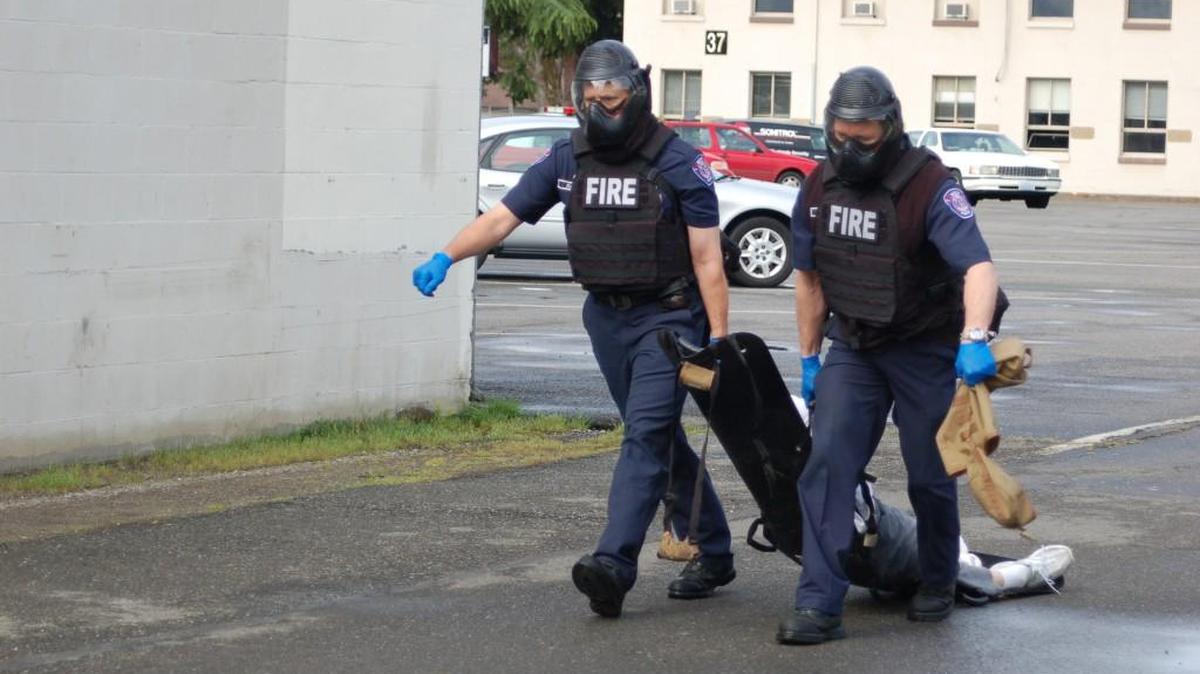 West Pierce firefighters wear ballistic vests during a multi-agency training with law enforcement. East Pierce Fire & Rescue is buying the vests and other protective gear.