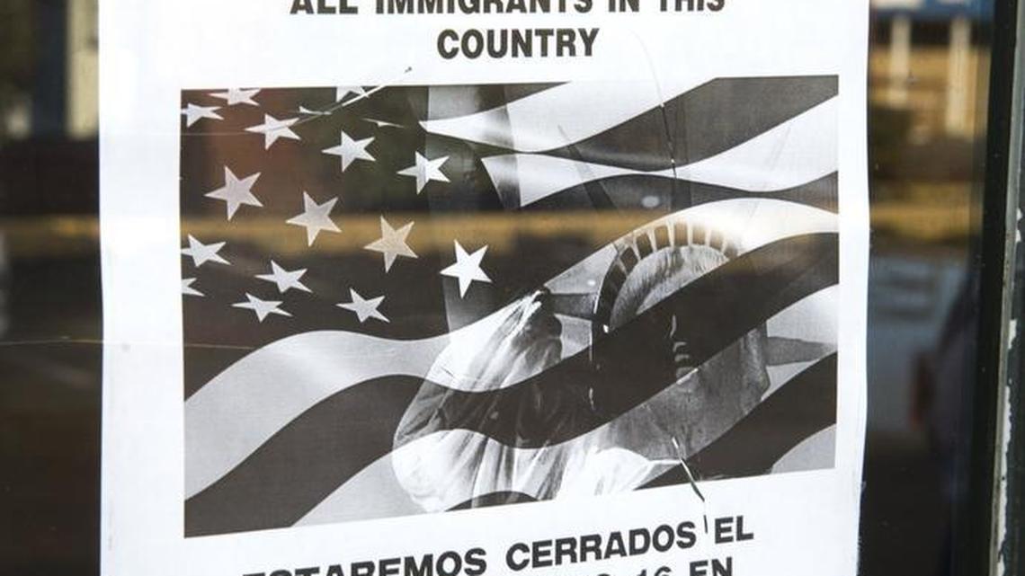 Top: La Huerta #2 International Market at 5605 Pacific Ave. in Tacoma was closed Thursday in support of the nationwide A Day Without Immigrants protest. Above: A sign on the entrance of Taqueria El Rinconsito at 7210 Pacific Ave. in Tacoma explains that the restaurant would be closed Thursday in solidarity with the national protest.