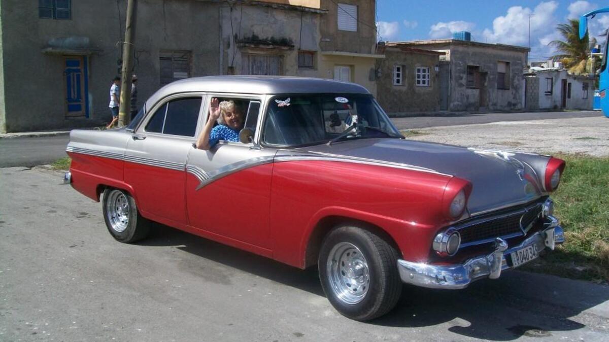 Marie Heft of Kent in one of the restored American cars popular in Havana.