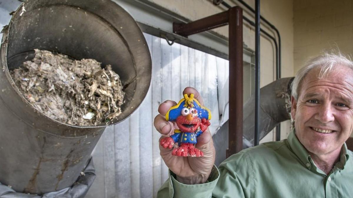 Dan Thompson, Division manager with the City of Tacoma's Environmental Services gingerly displays a popular children's toy typical of the type of in-organic waste often found in the cities sewer lines that can cause costly blockages Thursday 0630/16 at the Tacoma Central Wastewater Treatment Plant. In addition to plastics, non-biodegradable wipes Thompson says grease is often a culprit in blocking city sewer lines.