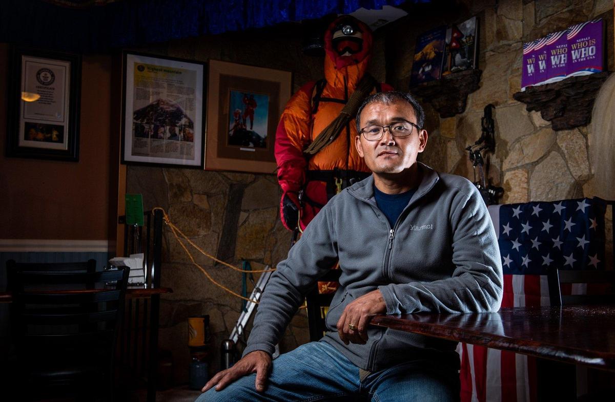 Lhakpa Gelu Sherpa has worked as a guide on both Mount Everest and Mount Rainier. He holds the record for the fastest ascent of Everest. Photographed at his restaurant, Wildberry Restaurant, in Ashford, Wash., on June 20, 2019.