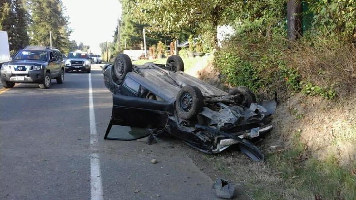 This car struck a pedestrian before rolling Tuesday afternoon along Meridian East in Graham, according to the Washington State Patrol.