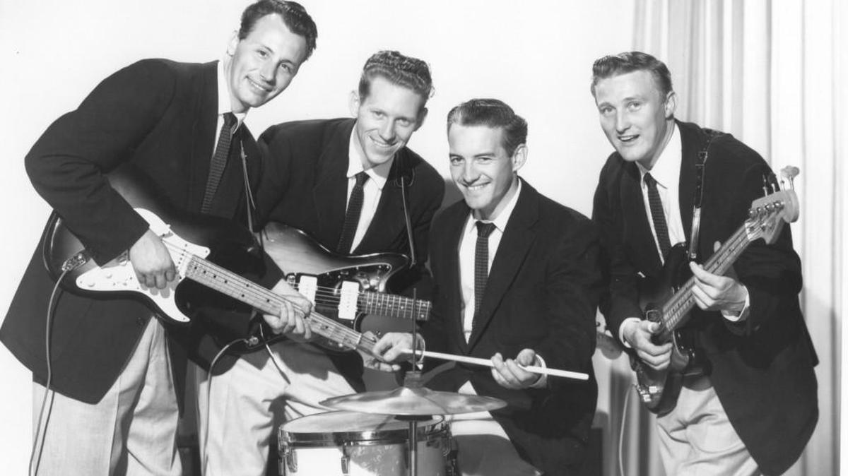 On April 26, 1960, the members of the Tacoma-based rock group “The Ventures” modeled their clean-cut look with matching blazers, ties and khakis. The fresh faced young musicians, from left, Nole F. (Nokie) Edwards, Bob Bogle, Howie Johnson and Don Wilson, posed with their shiny new Fender guitars.