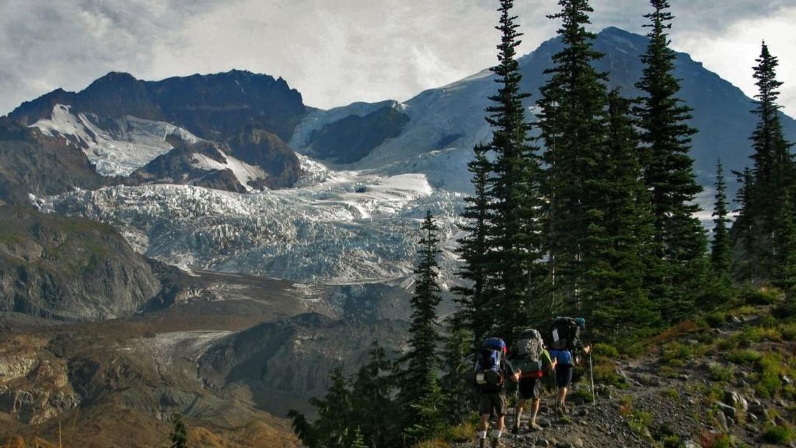 Mount Rainier looms hiking toward the Tahoma Glacier on the west side. Photo taken on the 93-mile Wonderland Trail in Mount Rainier National Park on September 15, 2012.