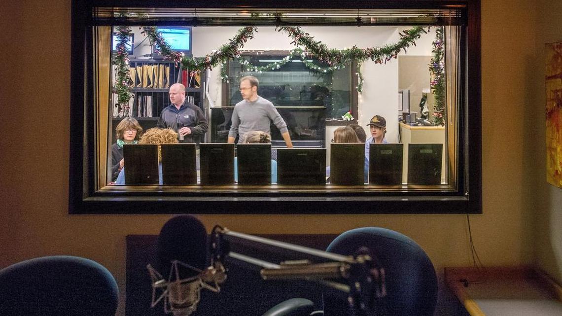 The news staff’s morning meeting as seen from a broadcast studio in the Seattle offices of KPLU. As of Wednesday afternoon Friends of 88.5 FM had raised $6,430,000, given by 17,000 individuals and businesses. When it reaches $6.5 million a matching $500,000 pledge will kick in.