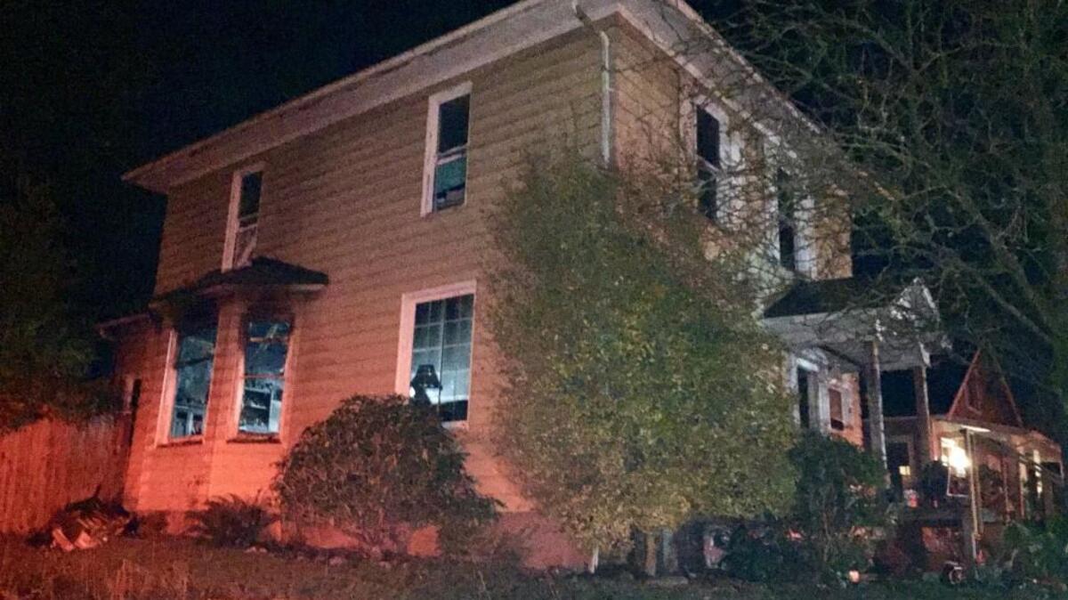 Tacoma fire fighters believe an unattended candle is to blame for a Wednesday morning house fire that injured one person, the Tacoma Fire Department stated in a tweet.
