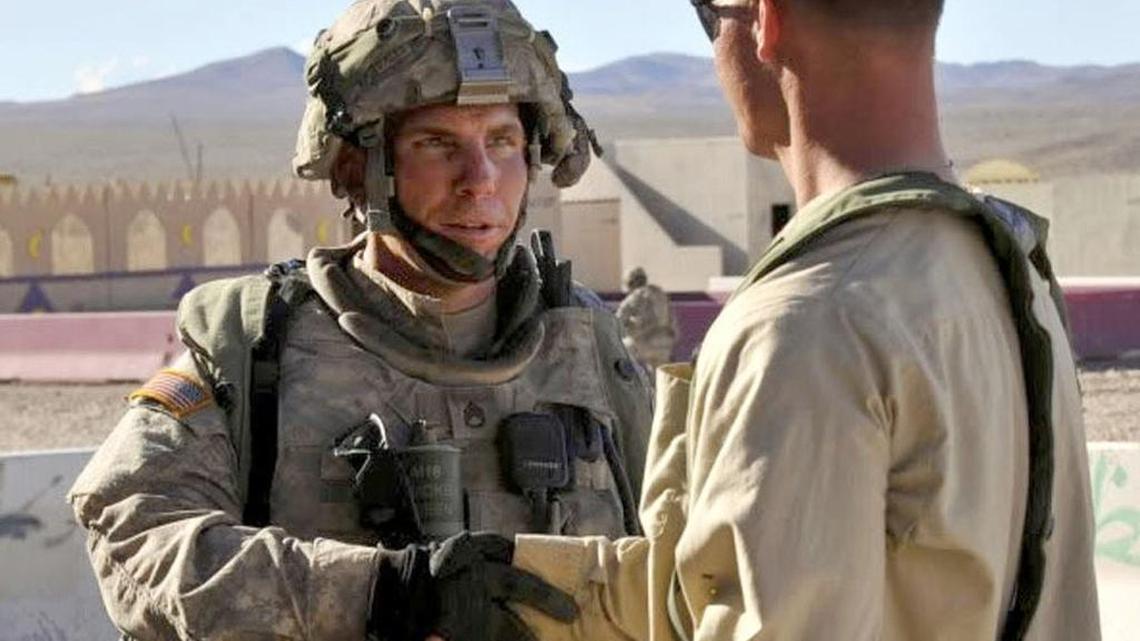 
Staff Sgt. Robert Bales, left, used his last stateside training before an Afghanistan deployment to practice interactions with Afghan villagers. He’s shown here in an August 2011 exercise at the National Training Center in California preparing for his last combat tour.

