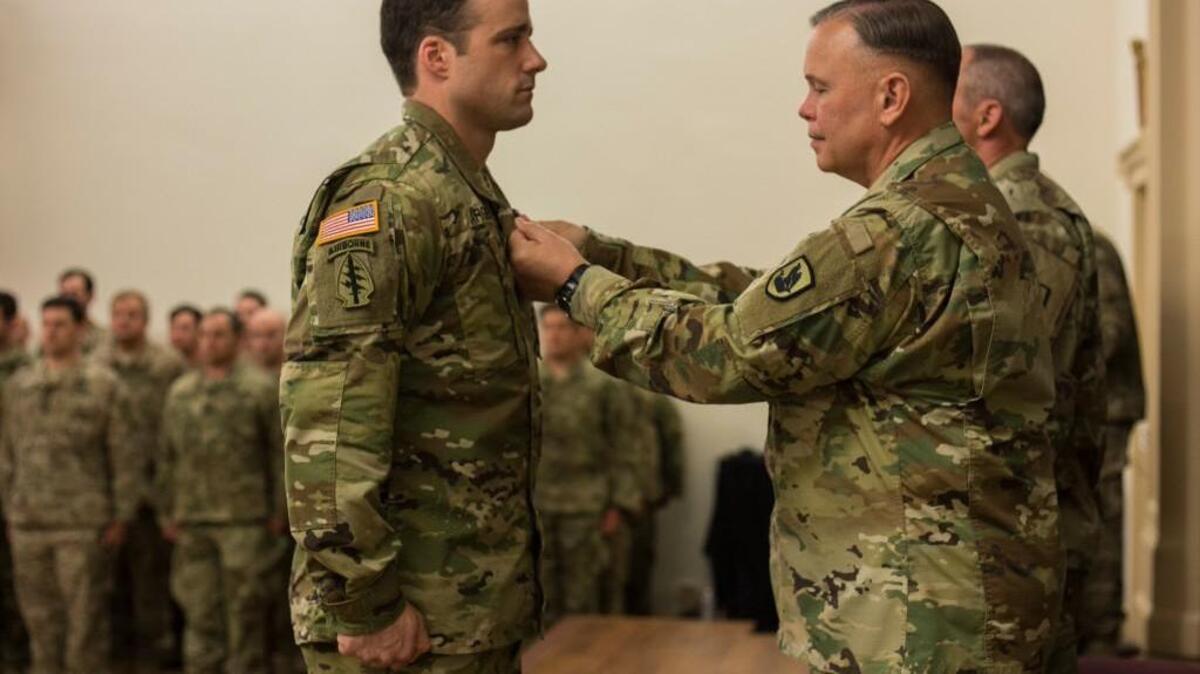 Staff Sgt. Michael Sargent receives a Silver Star during an award ceremony April 29 in Tacoma. Sargent distinguished himself by exposing himself without hesitation to enemy fire to secure a fallen Afghan commando and recover a fallen soldier in Afghanistan on Dec.17, 2015.